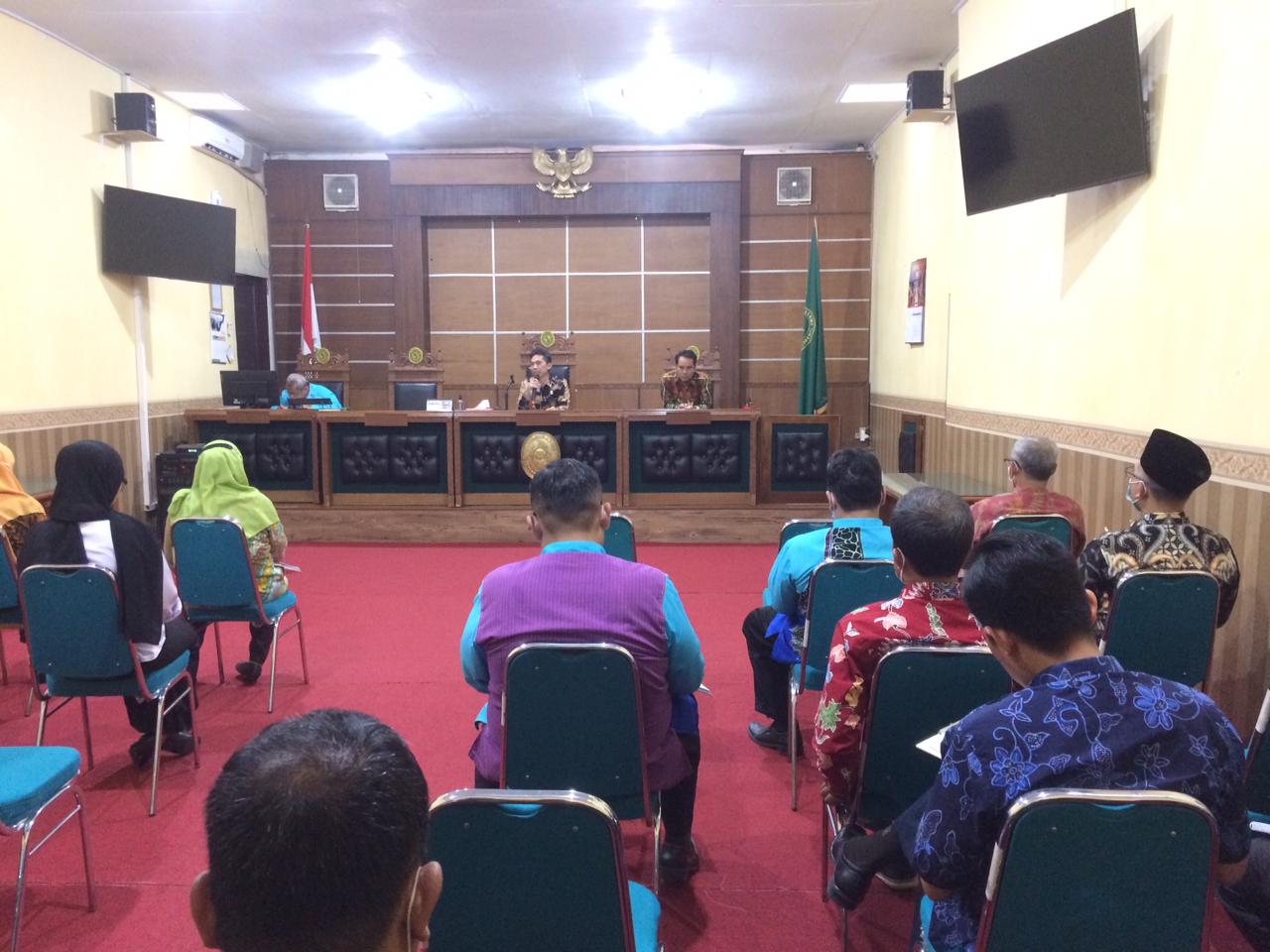 rapat juli 1